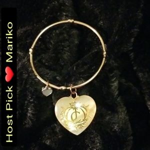 JUICY COUTURE VINTAGE golden colored bracelet with 2 attached charms